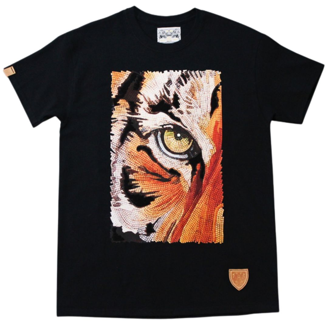 Black t-shirt with a tiger eye design on a white background with hand embroidery in black 