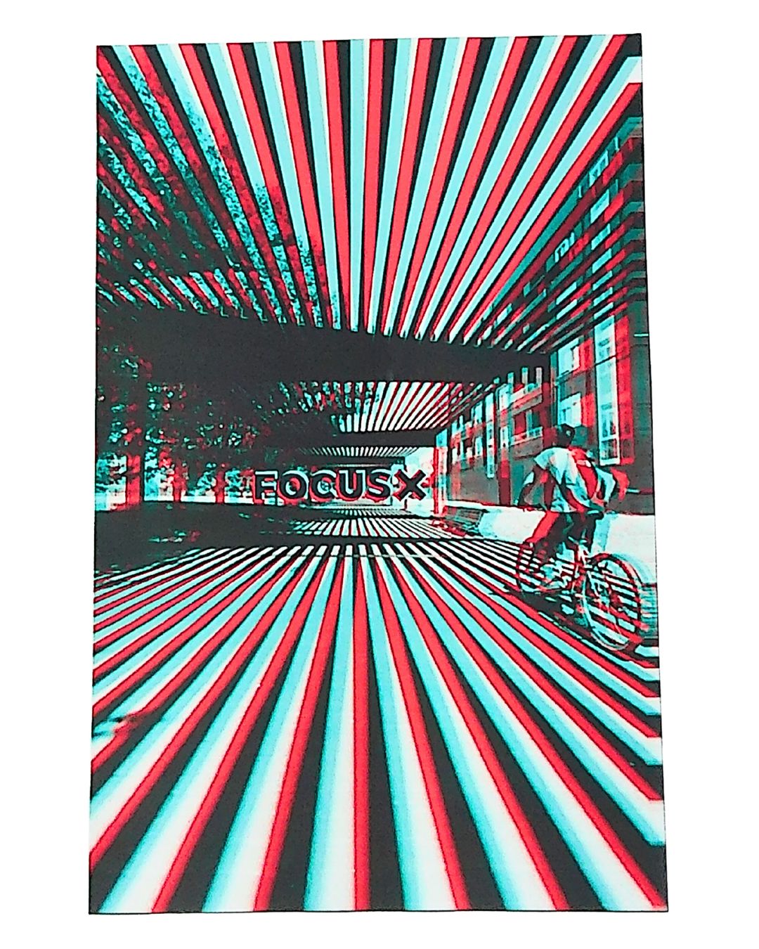 Opinionated poster with a person on a bike and the word 'FOCUSX' in a colorful, abstract design.