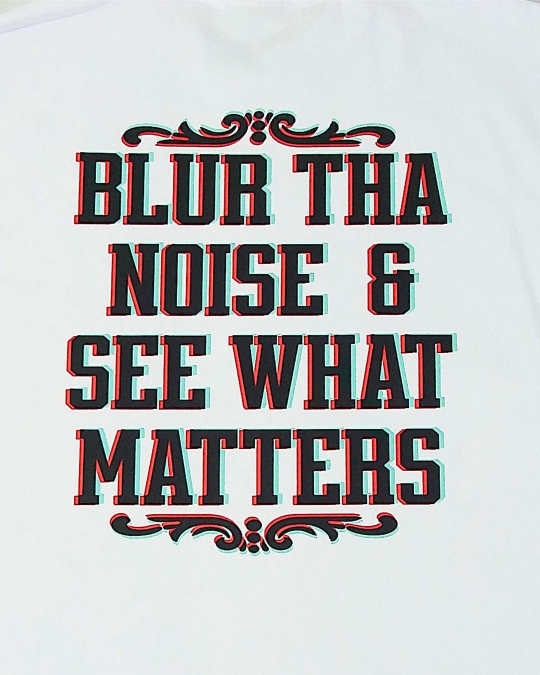 Text on a white background with decorative elements, 'Blur tha Noise & See What Matters'.